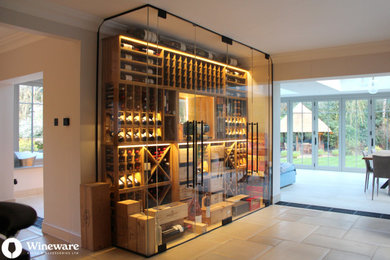 Photo of a contemporary wine cellar in Berkshire.