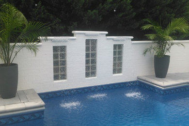 Example of a small trendy pool design in Other