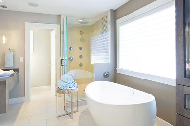 Bathroom - large contemporary master beige tile and multicolored tile ceramic tile and beige floor bathroom idea in Phoenix with brown walls, a vessel sink, tile countertops, a hinged shower door and brown countertops