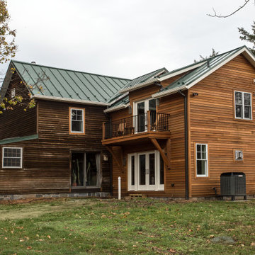 Log Farmhouse Renovation with Master Suite & Family Room Addition