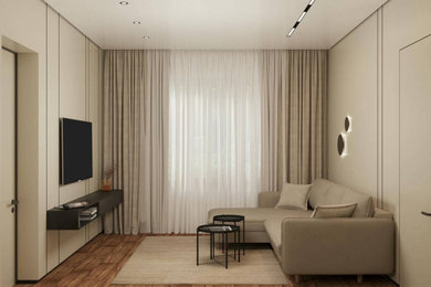 Example of a minimalist living room design in Other with beige walls