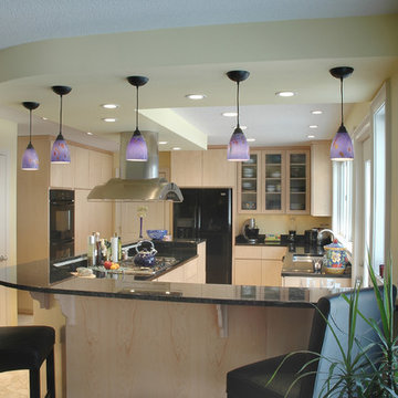 Contemporary Kitchen With Flat Panel Maple Cabinets