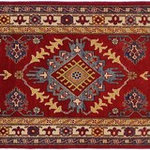 Bareens Designer Rugs - Tribal Kazak Stowe Red/Ivory Wool Runner - 2'8'' x 9'9'' - Embellish your home with this exquisitely hand-knotted Super Kazak Rug made with the finest hand spun wool and all vegetable dyes. Demonstrating incredible attention to detail, this hand-knotted masterpiece features an intricate Super Kazak pattern in a classic color palette. Made in the Caucasian designs from Russia and the northern Persian empire, each Super Kazak incorporates distinctive tribal flavor with elements such as the stepped hooted polygons, geometrical medallions, animals and rosettes. The straight, clean lines and bold tones embody the weaving style of the Armenian and Afghani weavers known for these iconic designs. This magnificent rug featuring soft luscious pile and is made with handspun wool and natural dyes to produces soft luminous shades causing a beautiful sheen. With geometric designs and bold vibrant saturated colors predominately blues, reds, greens, and gold make a bold statement in any decor. The construction technique used ensures that the designs and colors Ae capable to withstand heavy traffic area.