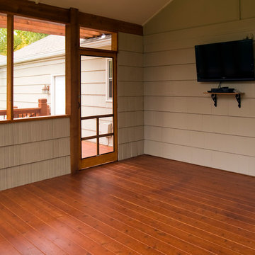 Lamping - Cedar deck in Kansas City with screened in porch.