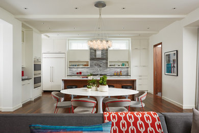 Inspiration for a contemporary open plan dining in Minneapolis with dark hardwood floors and white walls.