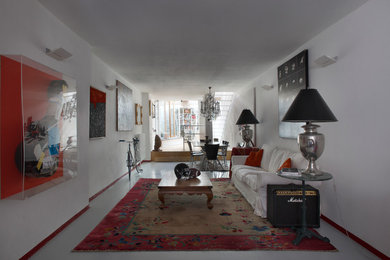 Living room - eclectic living room idea in Milan