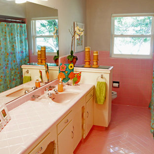 Bathroom - transitional pink tile pink floor bathroom idea in Dallas