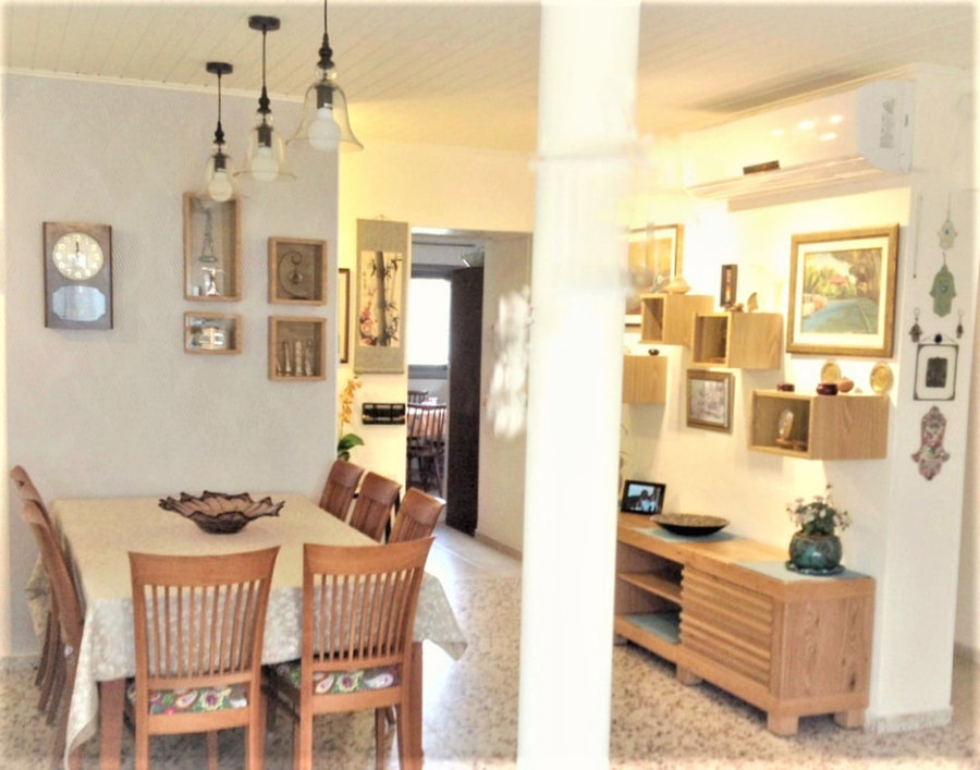 New dining area with soft silvery wallpaper