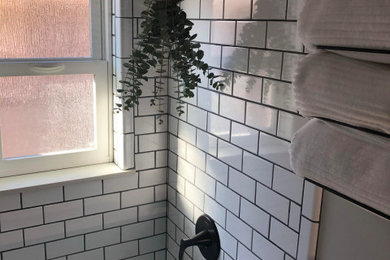 Inspiration for a white tile and subway tile wood-look tile floor and gray floor bathroom remodel in Salt Lake City