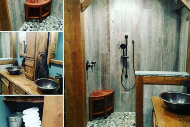 Mid-sized mountain style kids' gray tile and porcelain tile pebble tile floor and multicolored floor bathroom photo in Philadelphia with furniture-like cabinets, medium tone wood cabinets, a one-piece toilet, blue walls, a vessel sink and wood countertops
