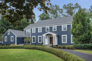 Inspiration for a large transitional blue two-story concrete fiberboard and clapboard exterior home remodel in Newark with a shingle roof and a gray roof