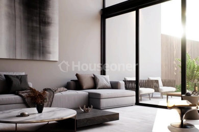 Diseño de salón con barra de bar abierto y gris y negro contemporáneo grande con paredes grises, suelo de bambú, chimenea de esquina, marco de chimenea de hormigón, televisor colgado en la pared, suelo gris y alfombra