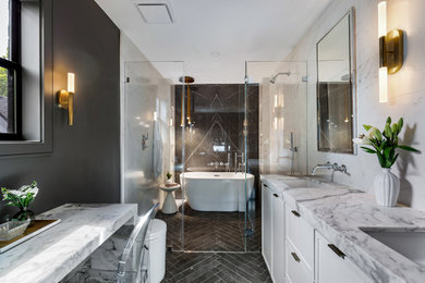 Small transitional master white tile and porcelain tile porcelain tile, black floor and double-sink bathroom photo in Houston with recessed-panel cabinets, white cabinets, black walls, an undermount sink, marble countertops, a hinged shower door, white countertops and a built-in vanity