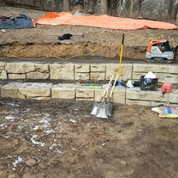 Amphitheater retaining wall in progress - Products