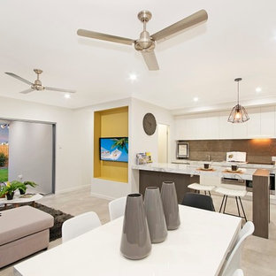 Mid-sized modern kitchen pantry photos - Kitchen pantry - mid-sized modern single-wall porcelain floor kitchen pantry idea in Townsville with a double-bowl sink, flat-panel cabinets, white cabinets, laminate countertops, gray backsplash, porcelain backsplash, stainless steel appliances and an island