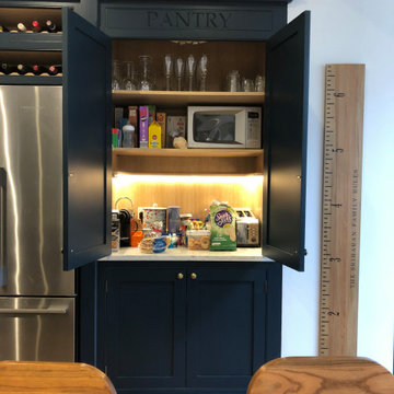 Stunning classic dark blue kitchen with a cafe style feel