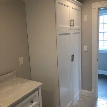 Boston Area Custom Storage Unit with Crown Molding and Adjustable Shelves