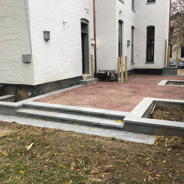 Red Brick Patio with Thermal Blue Border, Flower Boxes, & Steps in Washington DC