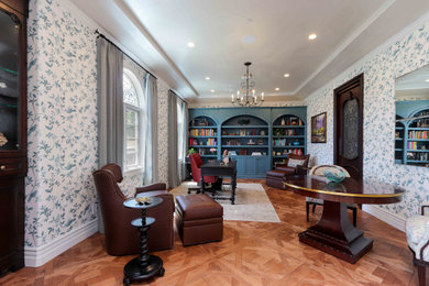 Example of a tuscan home office design in Orange County