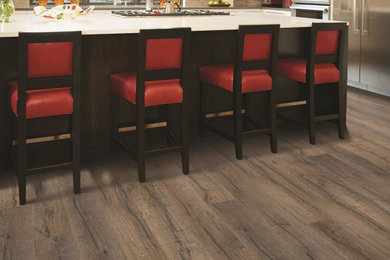 Kitchen - vinyl floor and brown floor kitchen idea