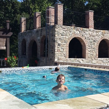 Tuscan style glass bottom rooftop pool