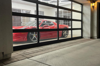 Garage - modern attached one-car garage idea in Phoenix