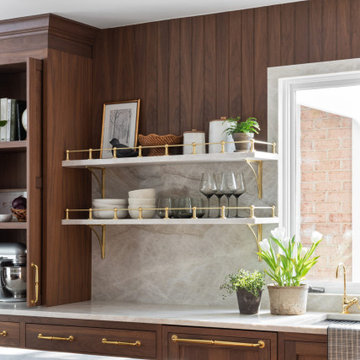Luxury Transitional Kitchen with Walnut Cabinetry, Marble Slab Backsplash & Bras