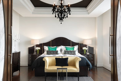 Design ideas for a contemporary bedroom in St Louis with white walls and dark hardwood floors.