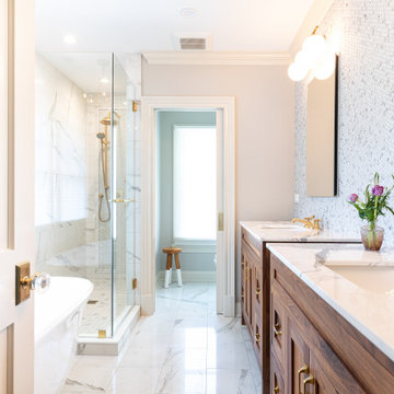 Luxury Primary Bathroom with Custom Double Vanity and Marble Tile