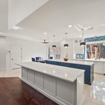 Wide Angle Open Concept Kitchen Living Area with Double Quartz Islands