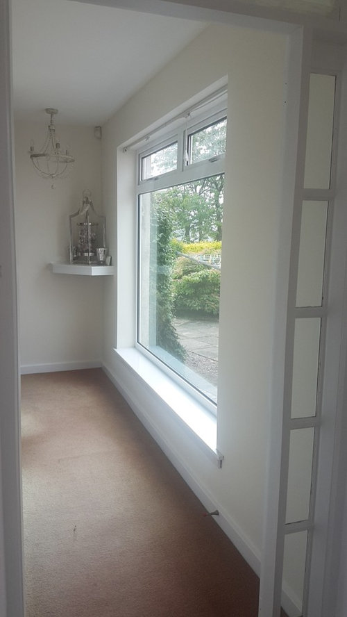 Large window at end of narrow hallway... roman blind or curtains ...