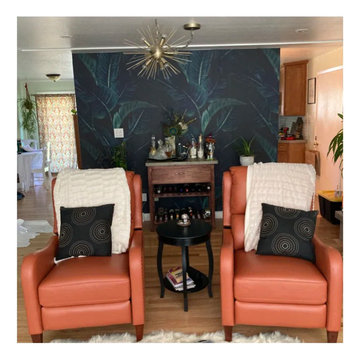 Tropical living room with orange leather recliners
