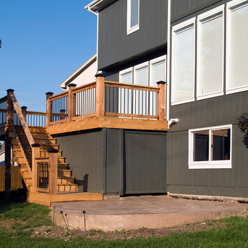 Smith - Cedar deck in Kansas City with stamped concrete patio.