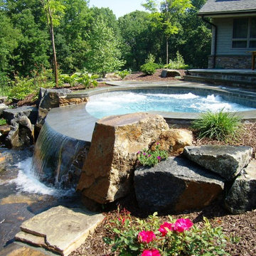 Delaware Township custom pool and raised spa with negative edge & water feature