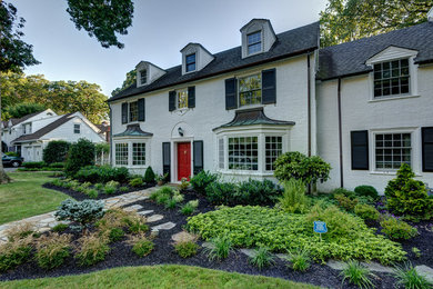 Example of a classic two-story gable roof design in Wilmington