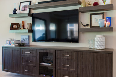 Example of a mid-sized transitional open concept ceramic tile living room design in Miami with beige walls, no fireplace and a wall-mounted tv