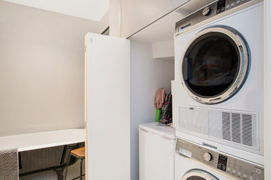 Design ideas for a transitional laundry room in Sydney.