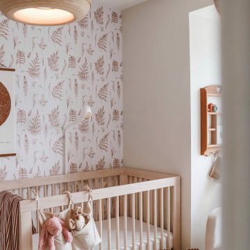 Baby Girl's Bedroom Design featuring removable wallpaper in custom colors
