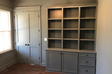 Mid-sized transitional dark wood floor and brown floor hallway photo in Louisville with gray walls
