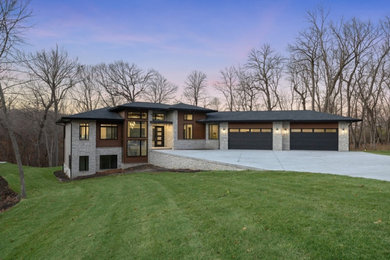 Example of a transitional exterior home design