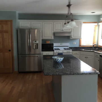 Kitchen refinished in white dove.Island/desk refinished in grey dolphin