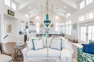Example of a beach style family room design in Austin