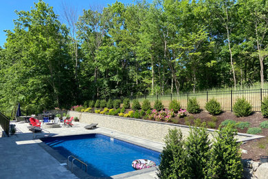 Backyard Retreat: A Raw Land Transformation: Pool Patio, retaining walls, steps