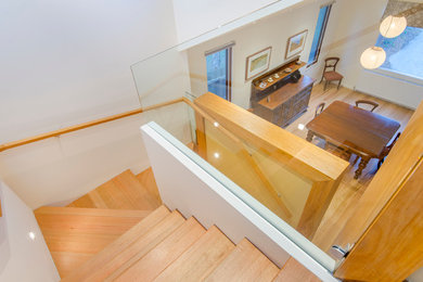 Photo of a contemporary wood staircase in Geelong with wood risers.