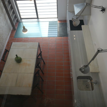Transformació d'una antiga xarcuteria en vivenda per a lloguer per habitacions