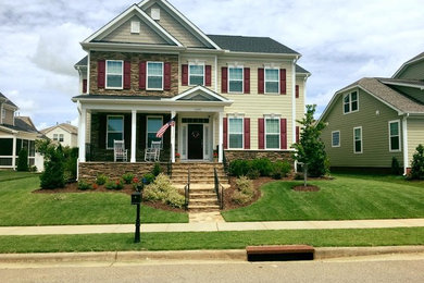 Photo of a mid-sized full sun front yard landscaping in Raleigh.