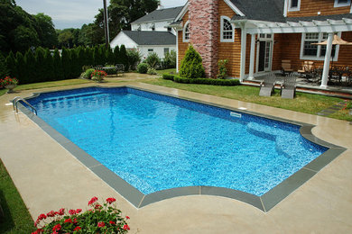 Inspiration for a modern pool remodel in Grand Rapids