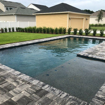 Swimming Pool with sun shelf in Oviedo, Florida