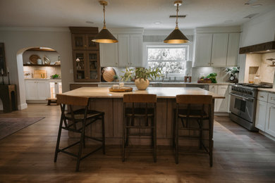 Example of a french country kitchen design in Orlando