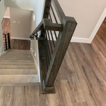Crafting Elegance: New Construction Stained Staircase